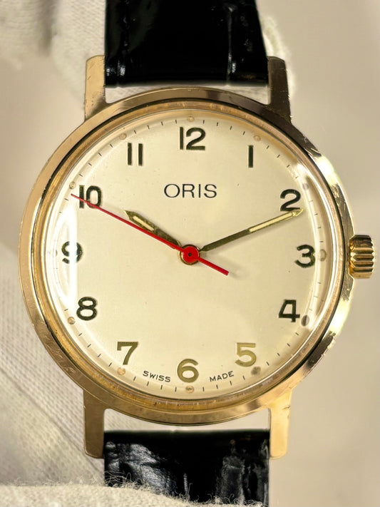 Oris 1973 dress watch — manual wind timepiece with 35mm gold-plated case and elegant vintage dial