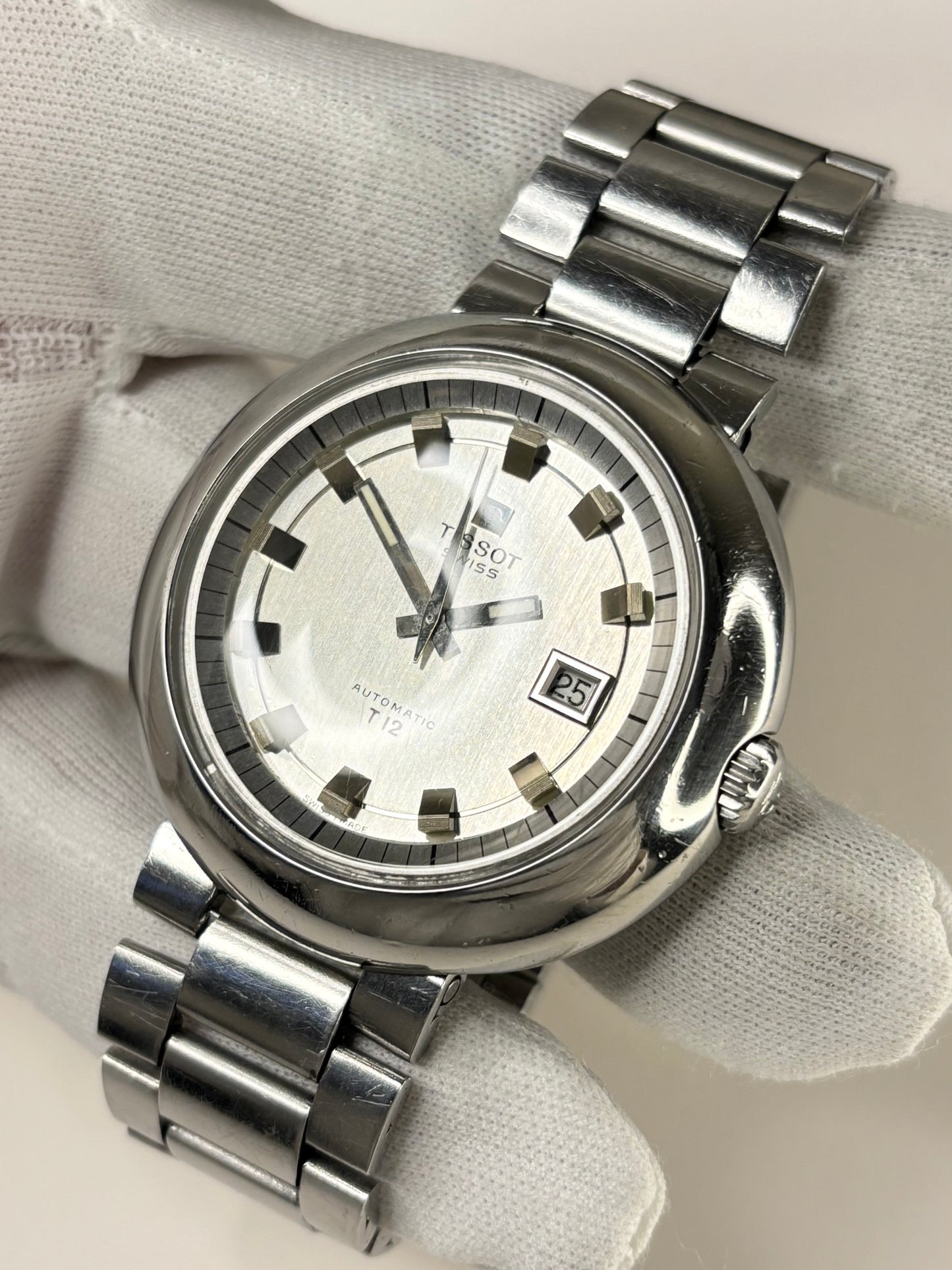 Side profile of Tissot Ref. 44592 1973 men’s vintage UFO watch timekeeper with distinctive stainless steel case styling Tissot signed crown