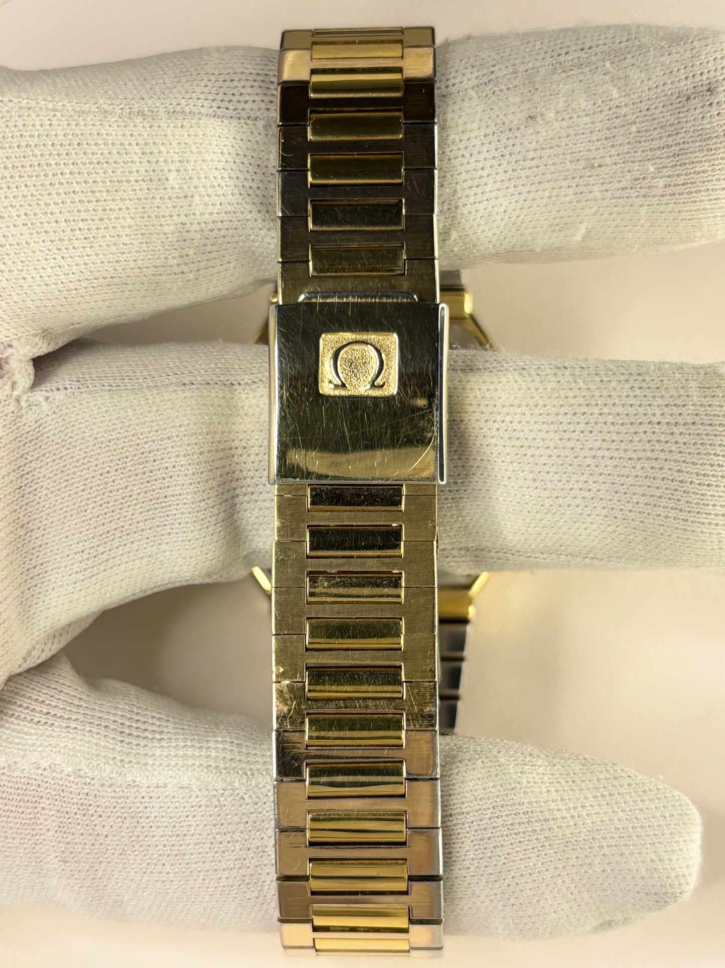 Vintage Omega De Ville dress timepiece from 1978 — reference 1365 quartz, 30mm gold-plated case with bracelet and manual