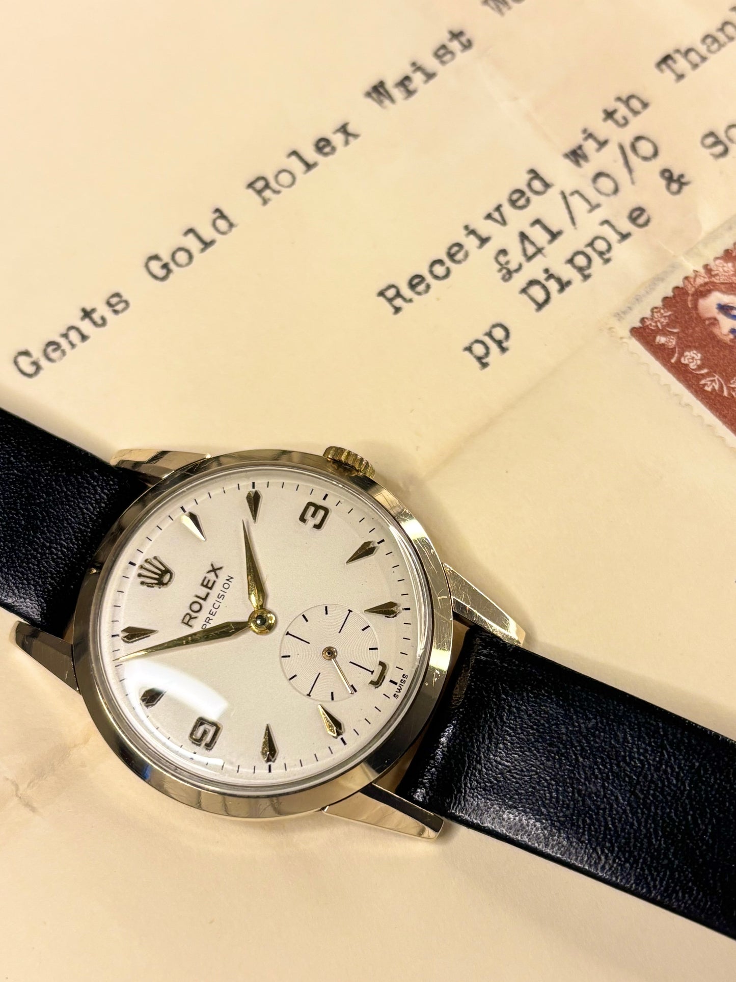 1954 Rolex Precision manual wind men’s watch ref. 1200, 9ct gold case with original sales papers