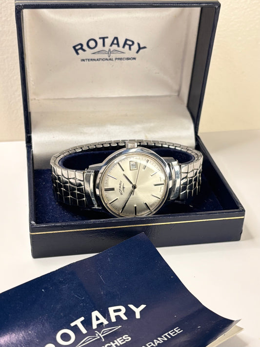 Vintage Rotary 1981 men’s stainless steel dress timekeeper showcasing refined Swiss design with box and papers
