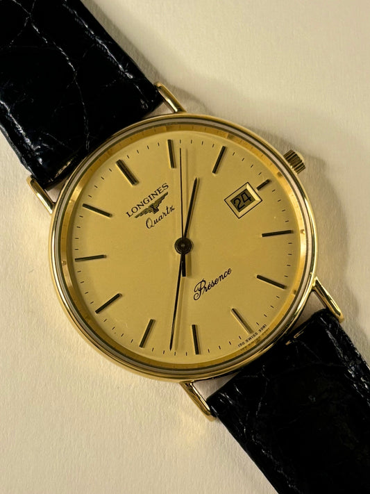 Vintage 1993 Longines Presence men’s dress watch 9ct solid gold case gold dial
