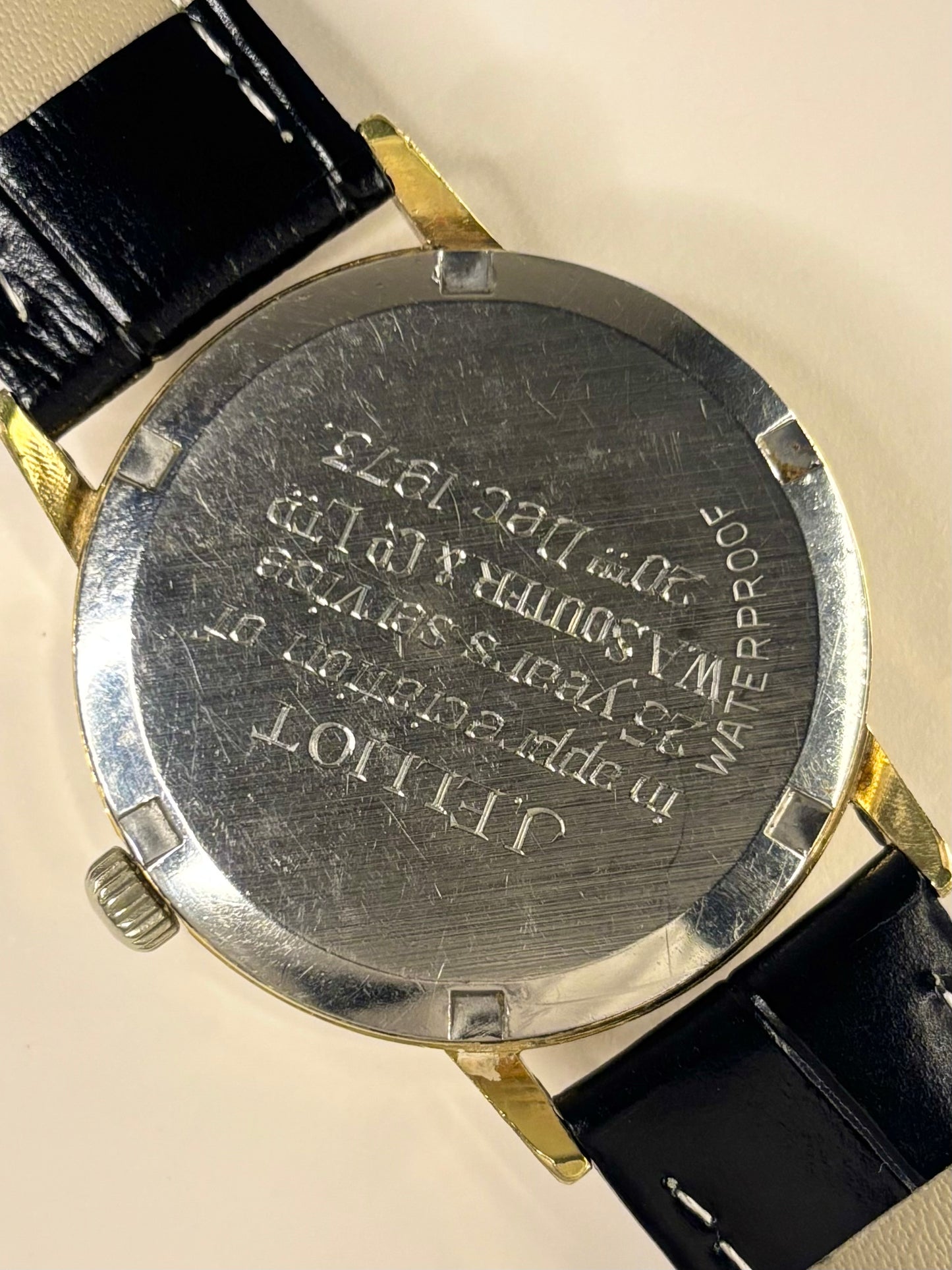 Caseback of Omega Genève vintage men’s watch ref. 135.070 with manual wind movement cal. 601
