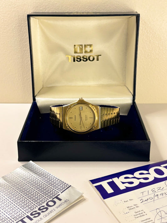 Vintage Tissot 1984 men’s gold plated dress timekeeper showcasing refined 1980s Swiss design with box and papers