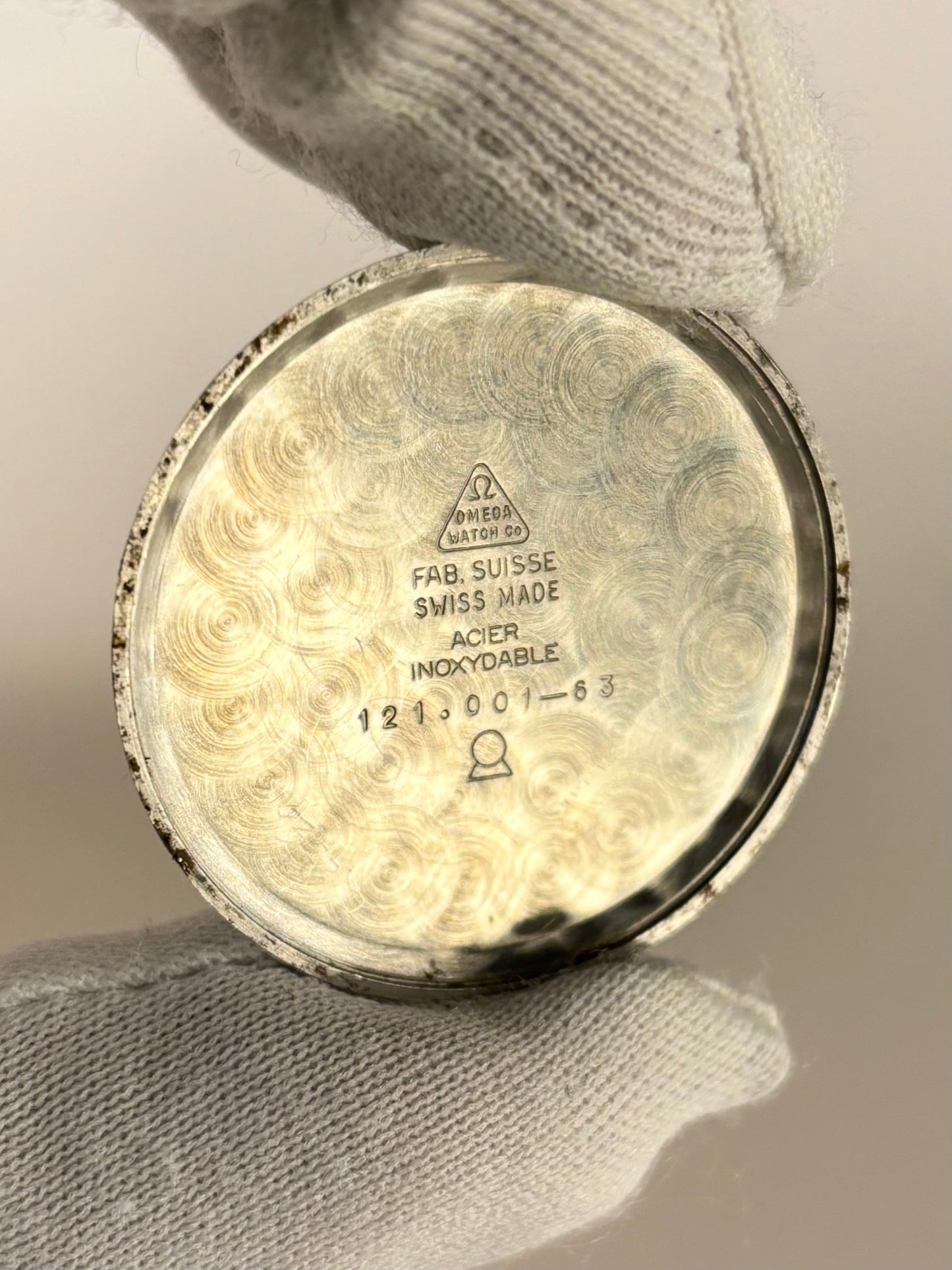 Omega Ref. 121.001-63 stainless steel 1962 men’s vintage timekeeper caseback view with hallmark details