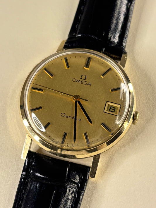 Luxury Omega Genève Ref. 132.8413 gold 9ct timekeeper showcasing timeless Swiss design