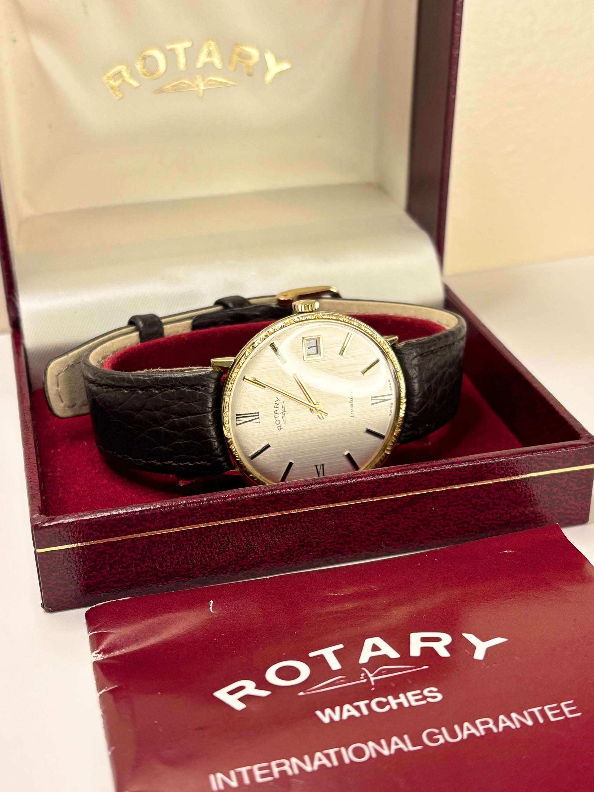 1990 Rotary manual wind men’s dress watch, gold-plated case, textured white dial, with box and papers