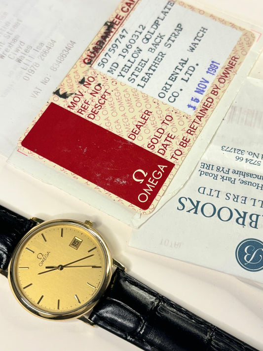 1991 Omega vintage men’s quartz watch, model 396.1012, calibre 1430, with warranty card and papers