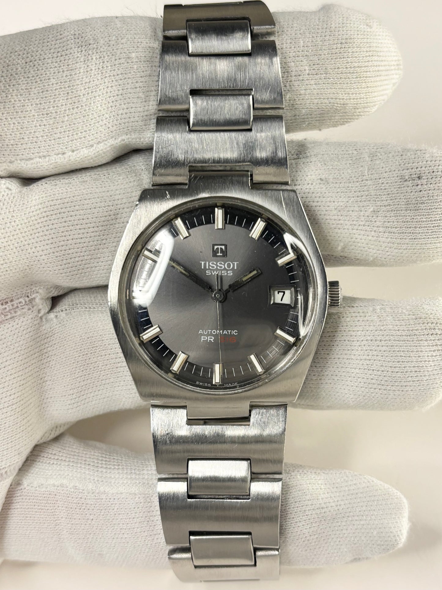 Collectible Tissot PR516 Ref. 44630-2X men’s 1973 vintage timekeeper featuring grey sunburst dial, automatic movement and original box