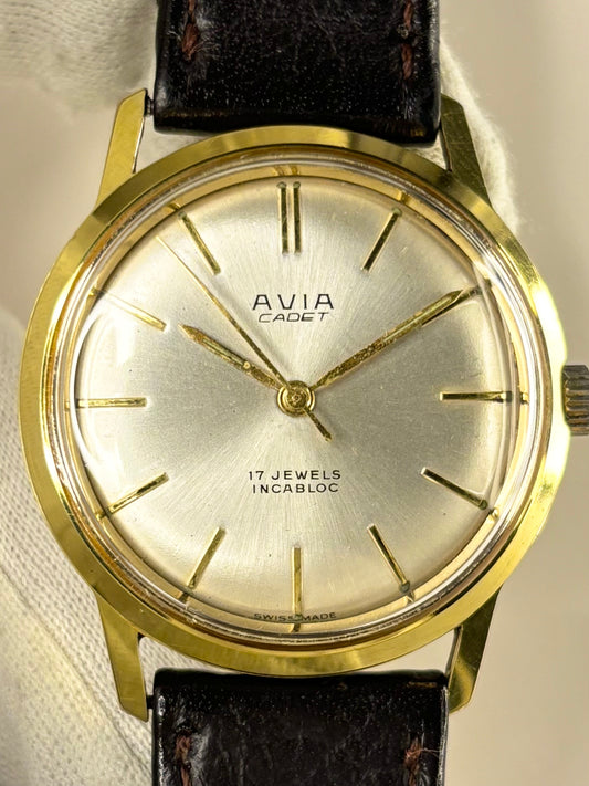 1968 Avia Cadet manual wind men’s watch, gold-plated case, white sunburst dial, vintage style