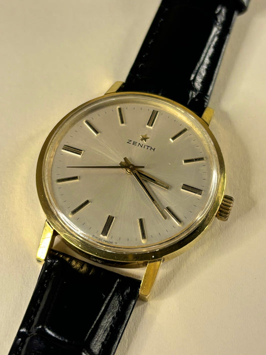 Vintage Zenith 1968 men’s gold plated dress timekeeper showcasing elegant Swiss design with sunburst dial