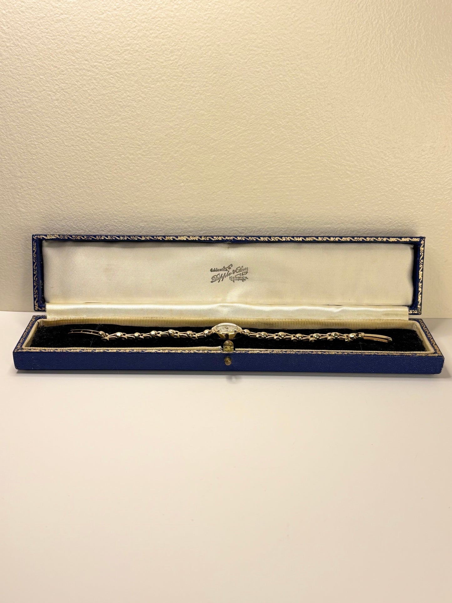 Avia 1966 solid gold ladies vintage timekeeper caseback view with hallmark details and presentation box