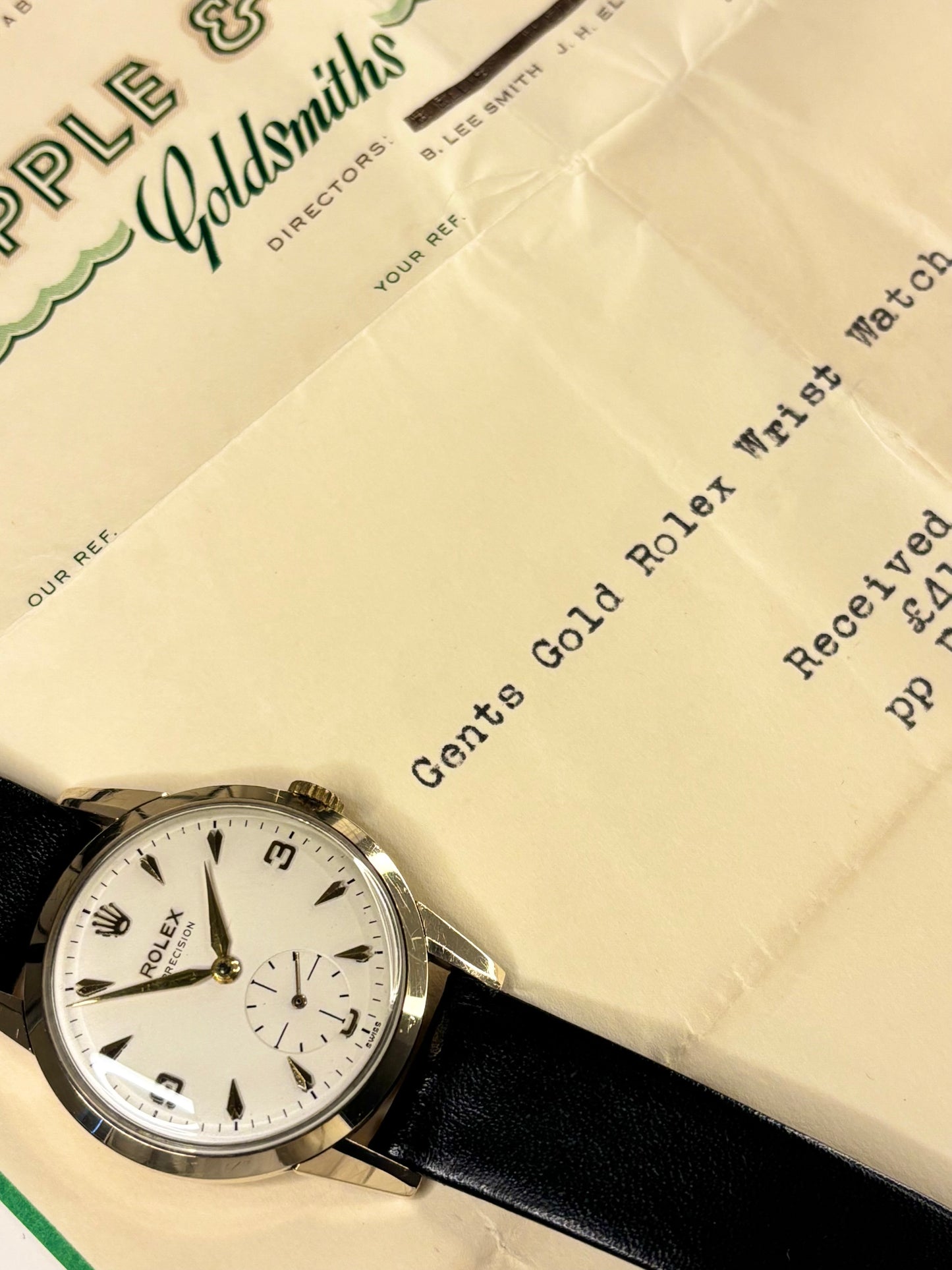 1954 Rolex Precision manual wind men’s watch ref. 1200, 9ct gold case with original sales papers