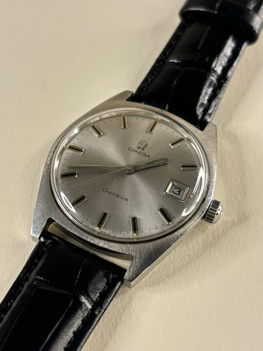 Vintage Omega Genève Ref. 136.041 men’s stainless steel dress timekeeper showcasing classic 1960s Swiss design