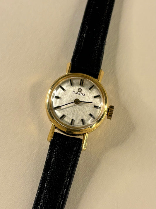 Vintage Omega ladies Ref. 511.073 gold plated 40 micron timekeeper showcasing elegant 1960s Swiss design