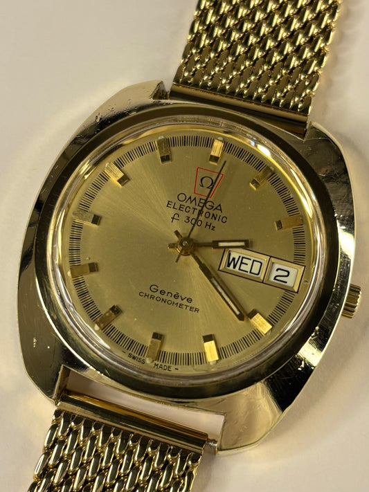 Luxury Omega Genève Ref. 198.031 gold plated timekeeper showcasing vintage Swiss design