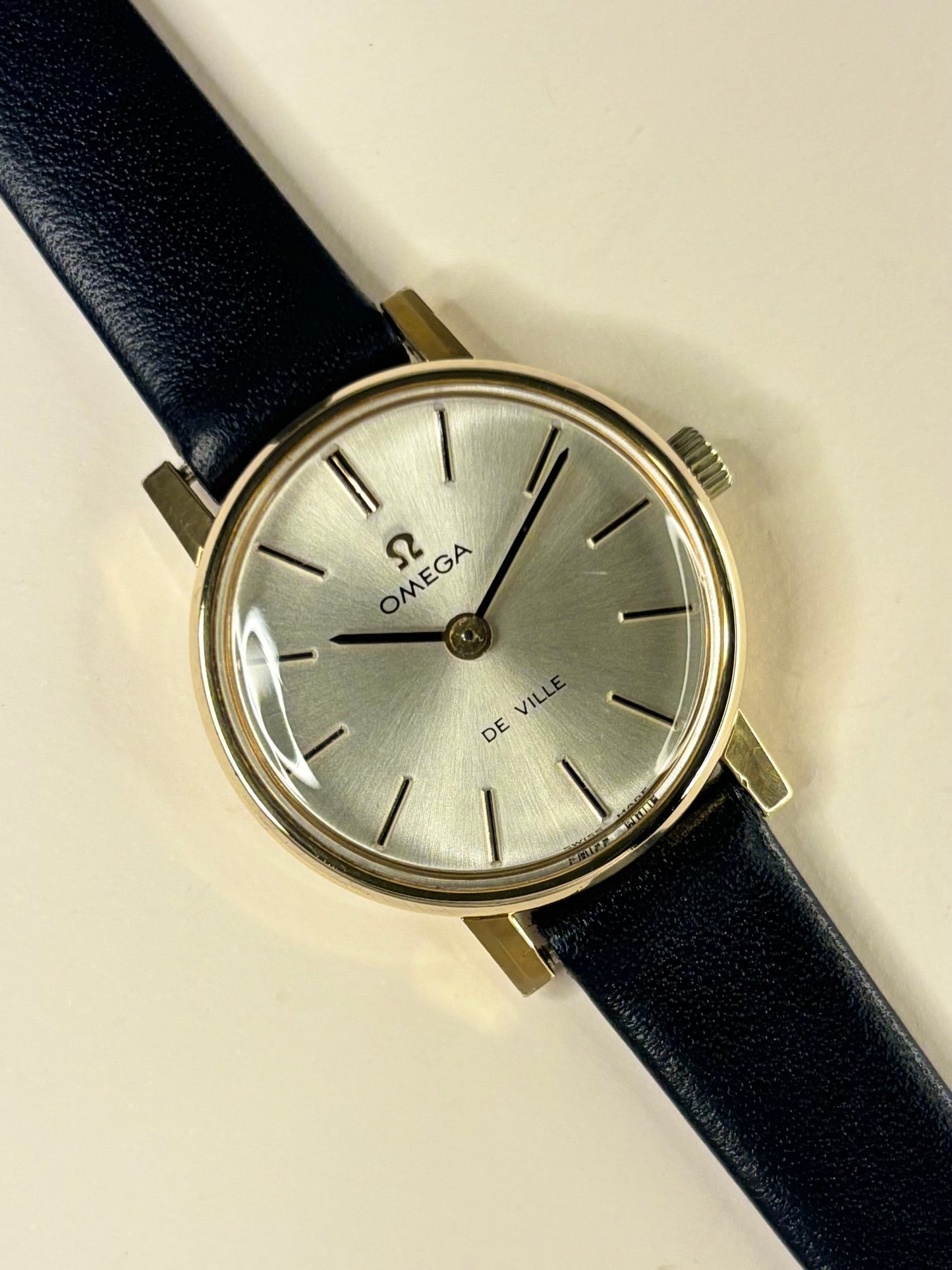 Omega ladies manual movement watch ref. 511.215, gold-plated case, original sales papers