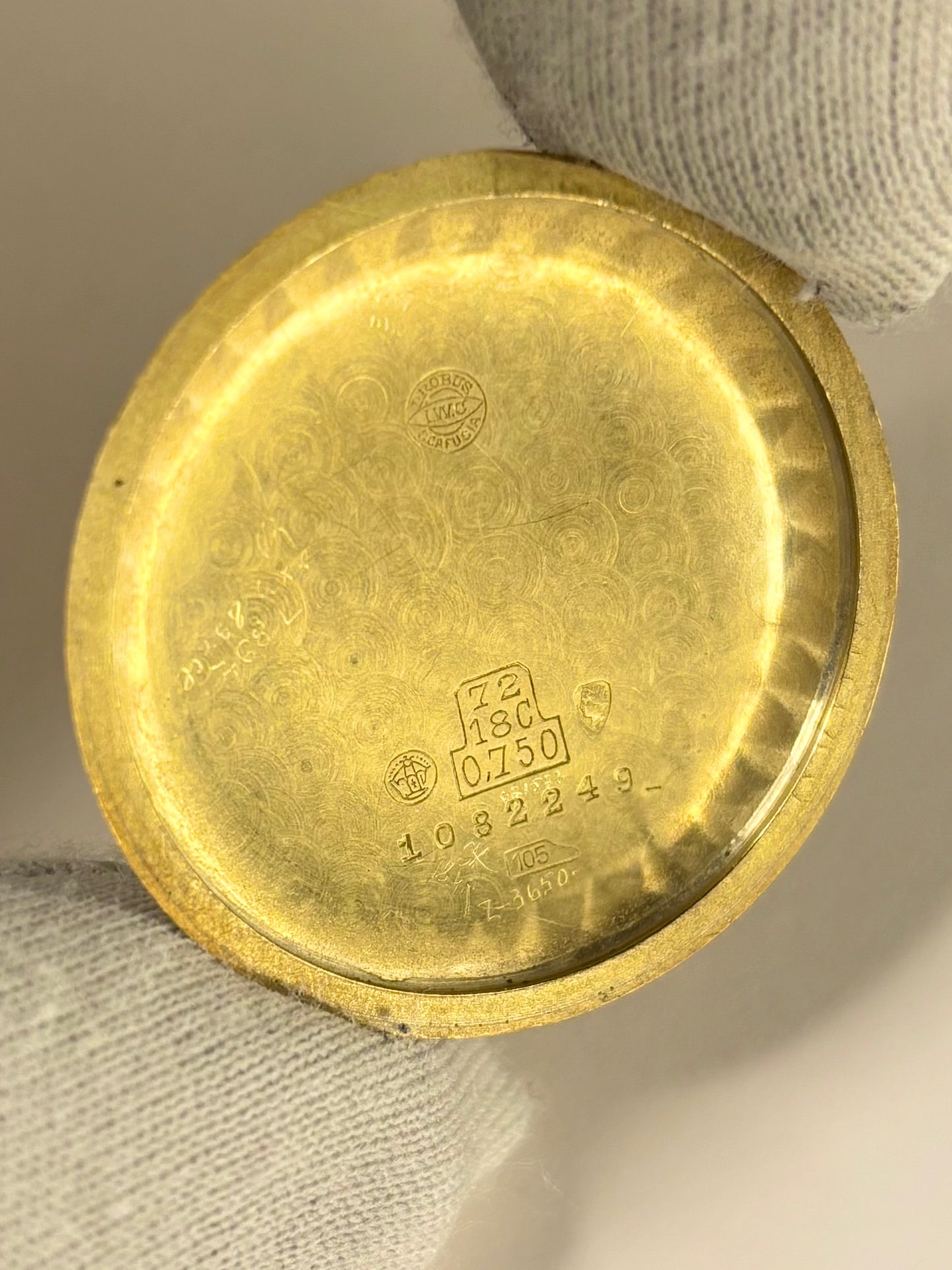 Caseback of IWC Schaffhausen 1944 18ct gold vintage men’s watch