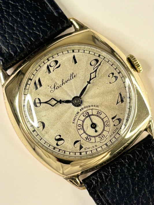 Sackville cushion timepiece ref. 1945 — manual wind vintage watch with slim 30mm rolled gold case