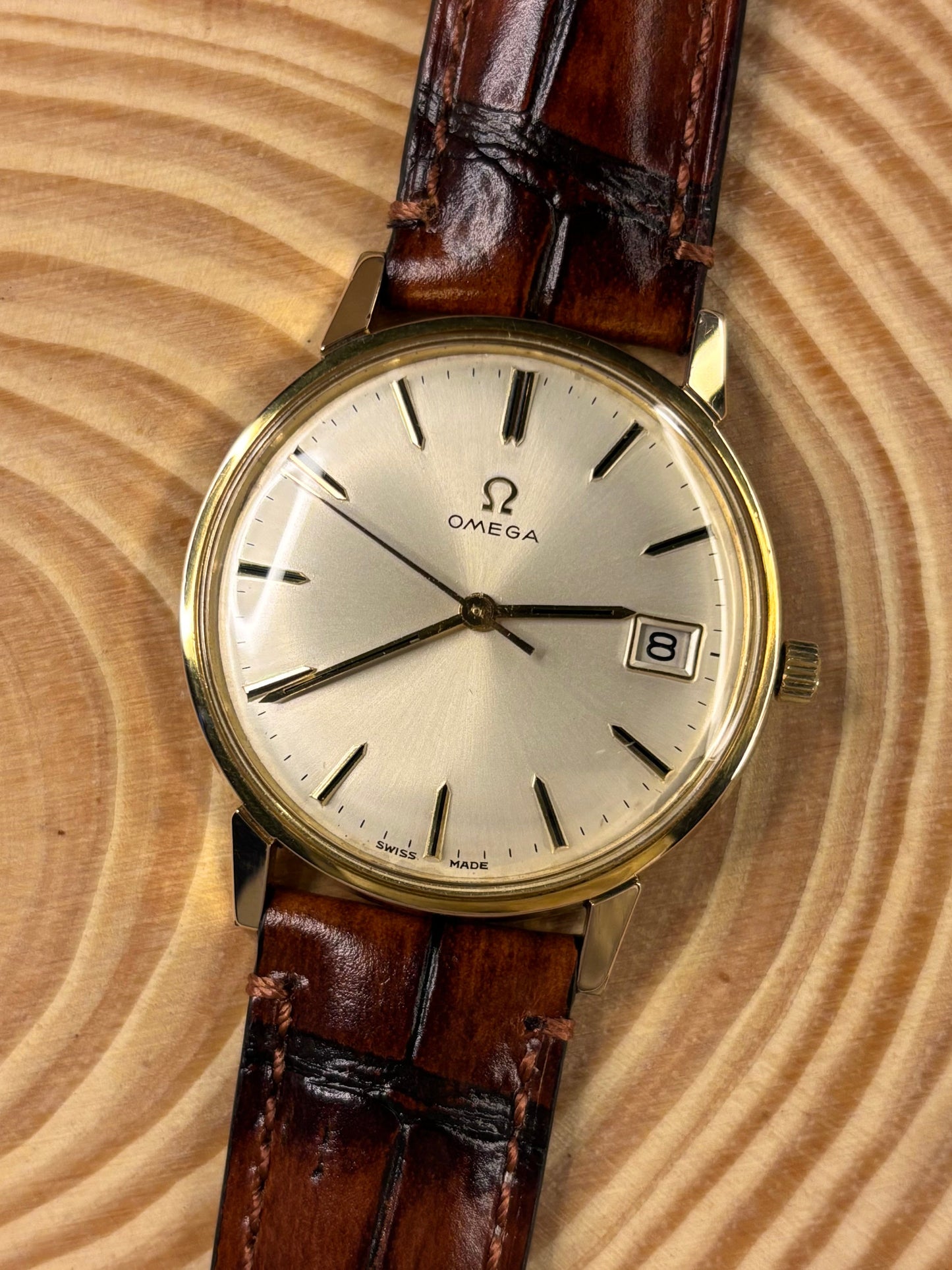 Luxury premium handmade brown Italian alligator grain leather strap made in Italy by skilled artisans, as seen on a vintage omega dress watch