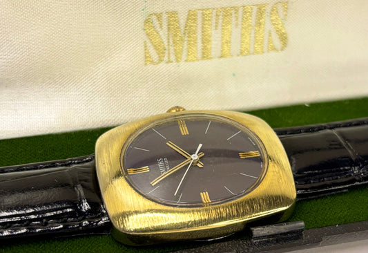 smiths vintage 1970s gold eclipse watch with purple dial and in box