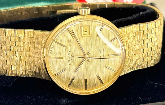rotary vintage 1970s integrated bracelet watch gold with date function 