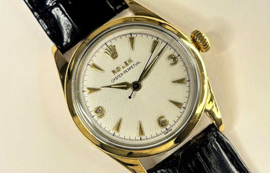 Rolex oyster perpetual bubble back gold dress watch 1950s