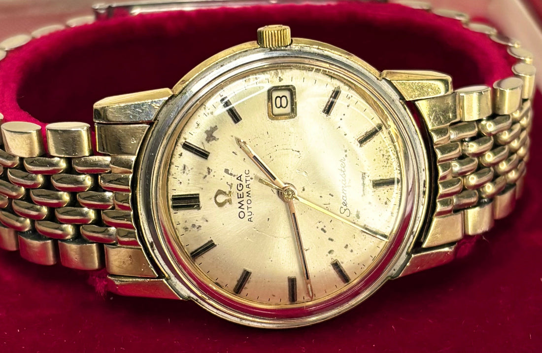 Omega Seamaster vintage 1960s gold watch fitted to a beads of rice bracelet 