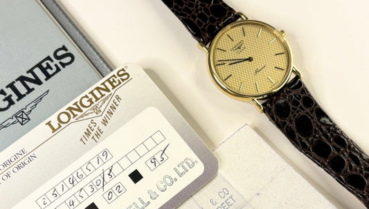 longines presence vintage 1990s gold dress watch