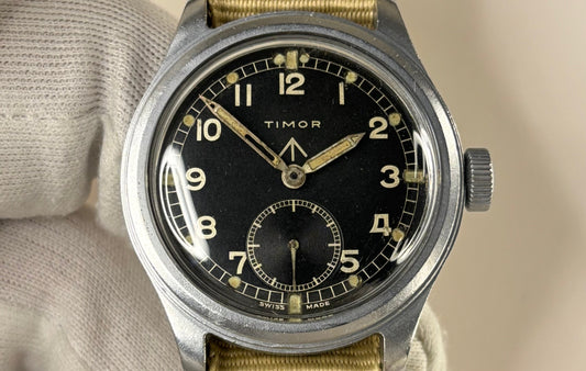 timor vintage dirty dozen British military ww2 watch, black diakl broad arrow markings WWW