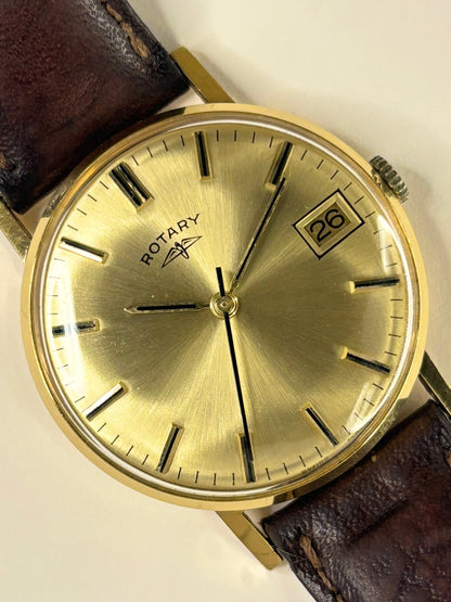 Rotary Ref. 1966 men’s 1966 dress timekeeper with gold plated case, gold sunburst dial and manual movement