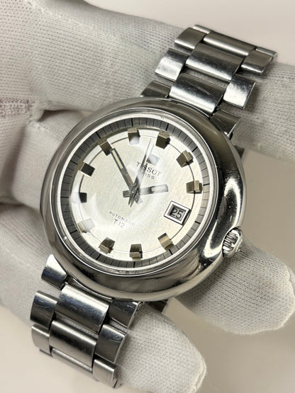 Side profile of Tissot Ref. 44592 1973 men’s vintage UFO watch timekeeper with distinctive stainless steel case styling Tissot signed crown 