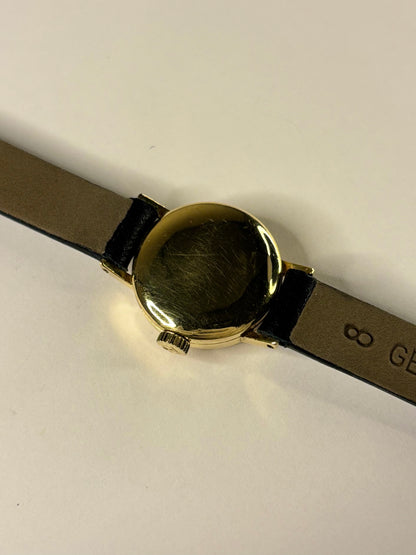 Tissot Ref. 17073-31 18ct gold ladies 1957 vintage timekeeper caseback view with hallmark details
