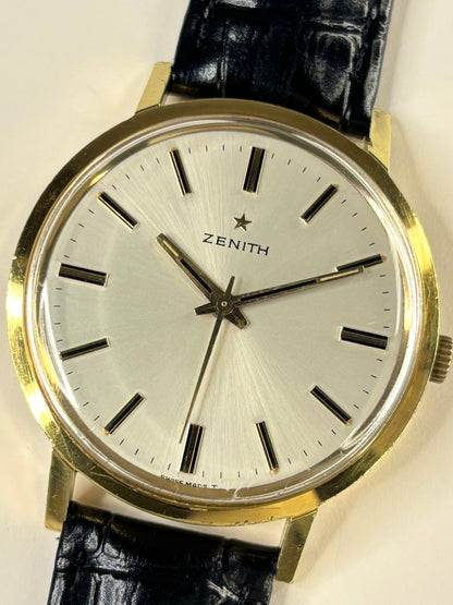 Collectible Zenith 1973 men’s vintage timekeeper featuring white sunburst dial and Swiss craftsmanship