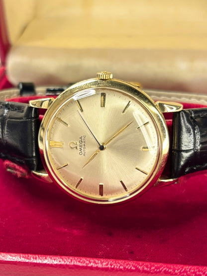 Omega men’s dress watch ref. 2446 with 14ct solid gold case and white sunburst dial, c.1963