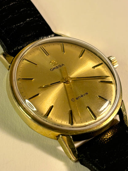 Vintage Omega Genève Ref. 601 men’s gold plated dress timekeeper showcasing elegant 1960s Swiss design