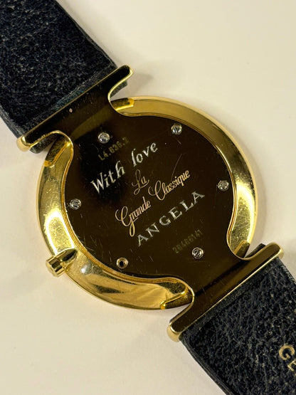 Caseback of Longines vintage 1991 men’s quartz gold plated dress watch