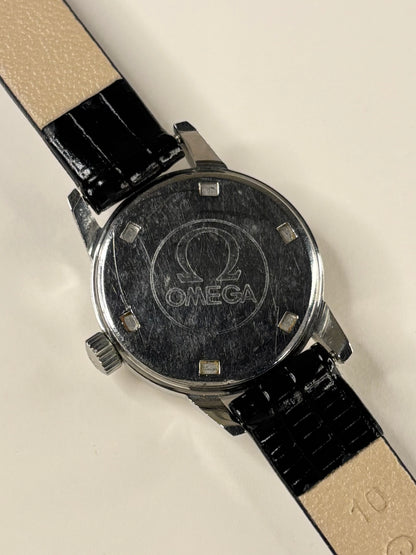 Omega Genève ladies Ref. 535.0025 stainless steel timekeeper caseback view with hallmark details