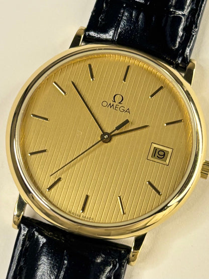 Close up of Omega De Ville 1989 men’s quartz watch gold plated case Cal. 1430