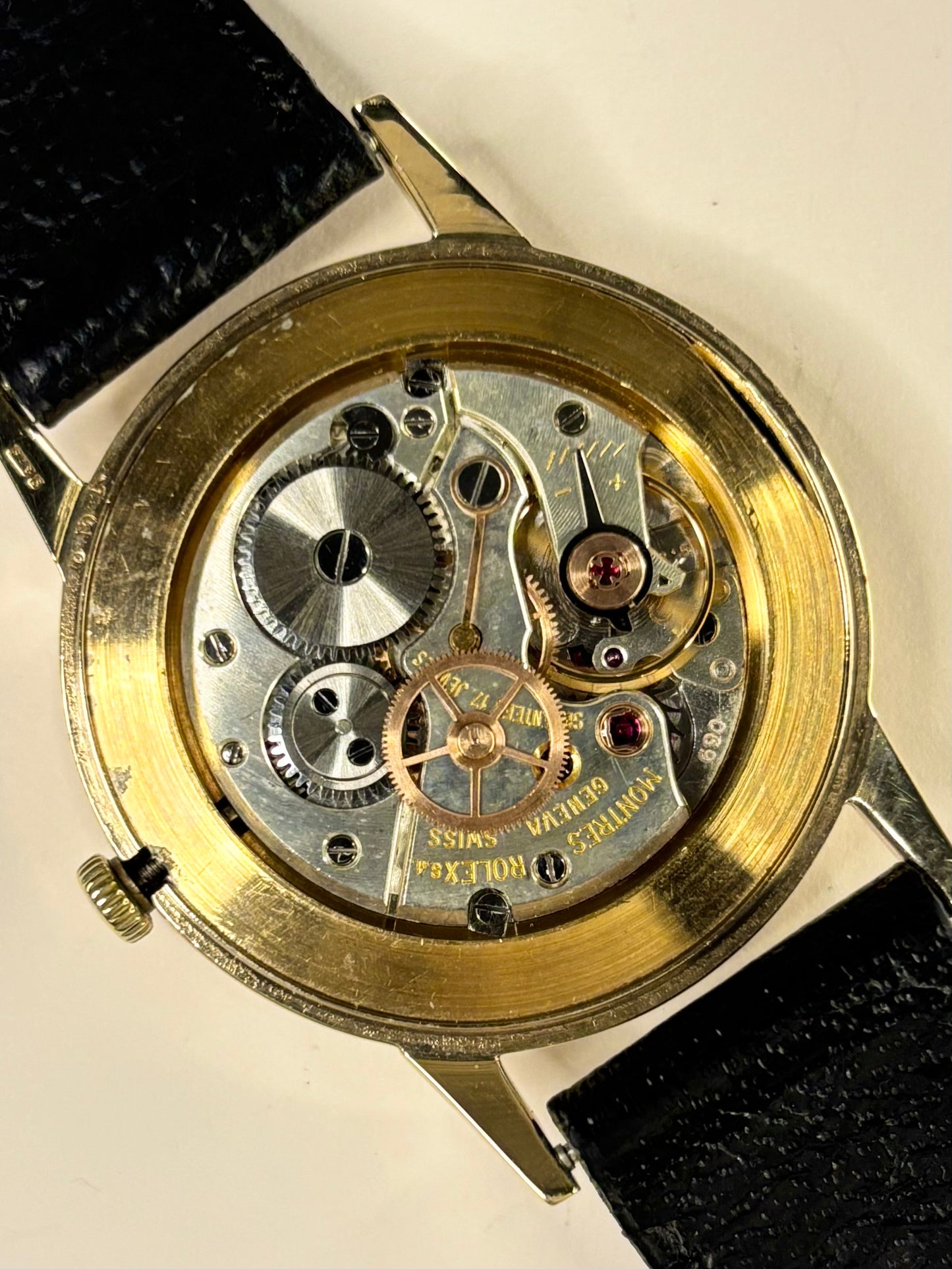 Macro photo of the Rolex Precision timepiece, movement 069 and model 12865, focusing on the 069 movement