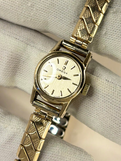 Vintage Omega ladies Ref. 1962 gold plated timekeeper showcasing elegant 1960s Swiss watch design