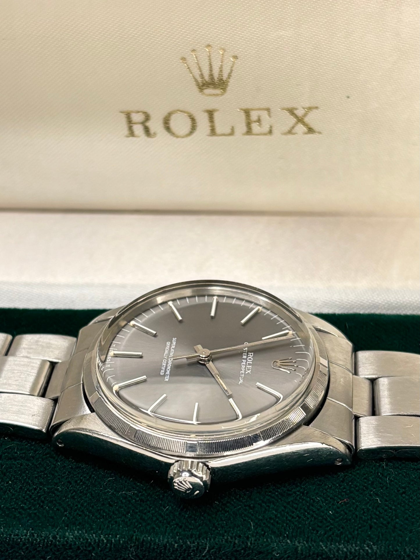 Vintage c.1973 Rolex Oyster Perpetual ref. 1002 automatic timepiece – men's stainless steel dress watch in great condition with only minor age-appropriate marks, recently serviced, complete with original box and papers.