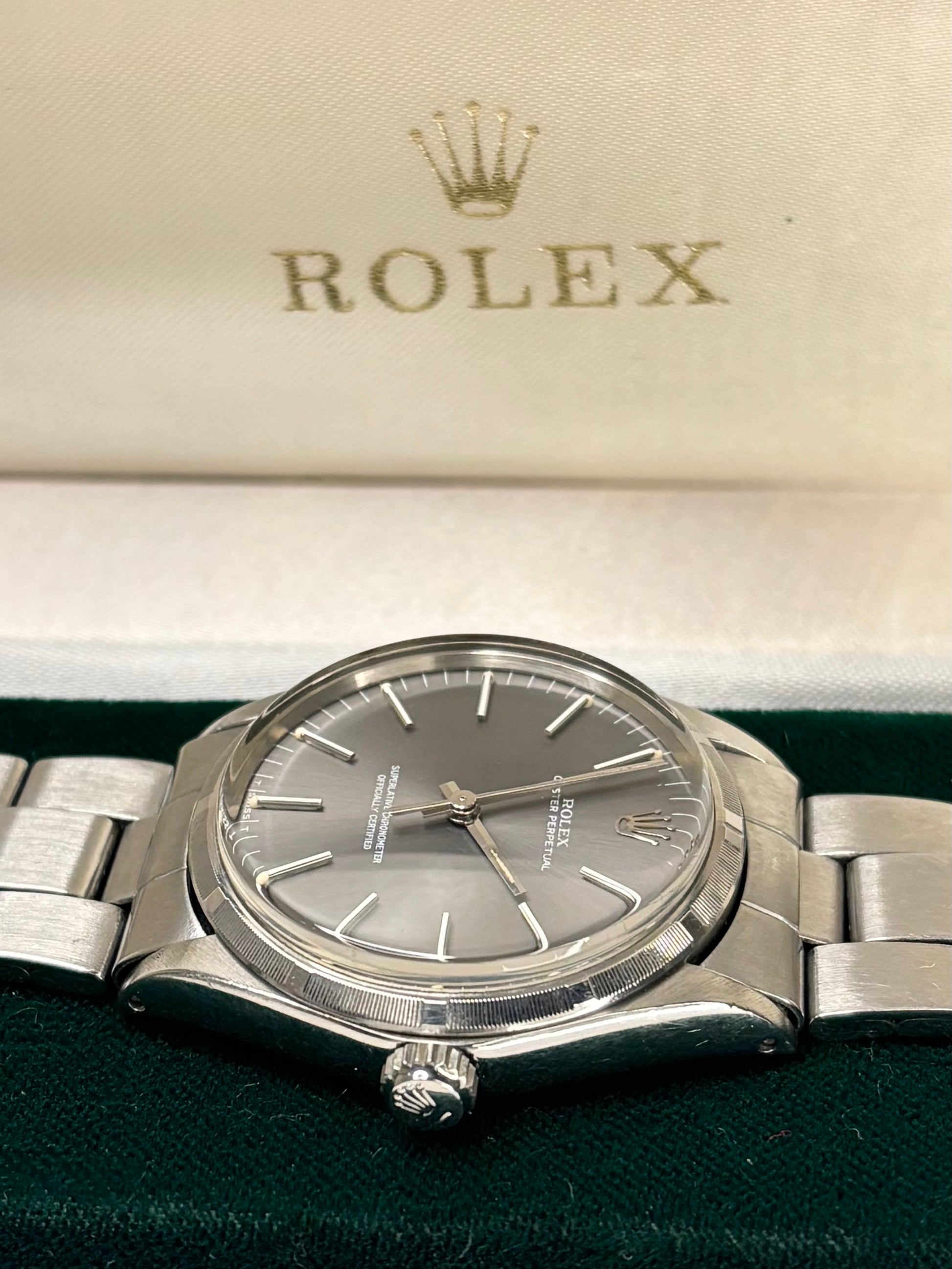 Vintage c.1973 Rolex Oyster Perpetual ref. 1002 automatic timepiece – men's stainless steel dress watch in great condition with only minor age-appropriate marks, recently serviced, complete with original box and papers.