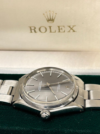 Vintage c.1973 Rolex Oyster Perpetual ref. 1002 automatic timepiece – men's stainless steel dress watch in great condition with only minor age-appropriate marks, recently serviced, complete with original box and papers.