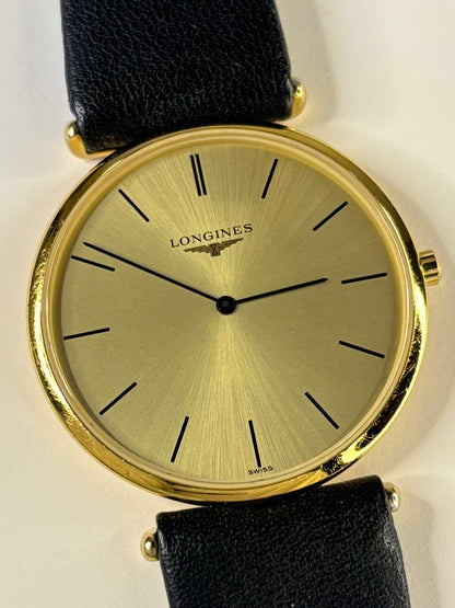 Close up of Longines 1991 men’s watch gold dial quartz Cal. 635 movement