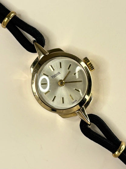 Tudor 1957 ladies vintage timekeeper with 9ct gold case, white sunburst dial and manual movement