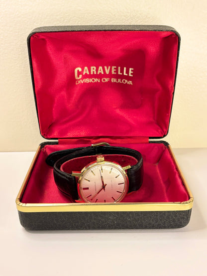 Close up of Caravelle 1974 vintage men’s watch white dial manual wind