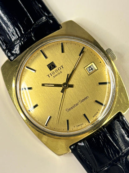 Vintage Tissot Seastar Seven timepiece and reliable timekeeper with gold-toned dial and gold-plated case, manual movement