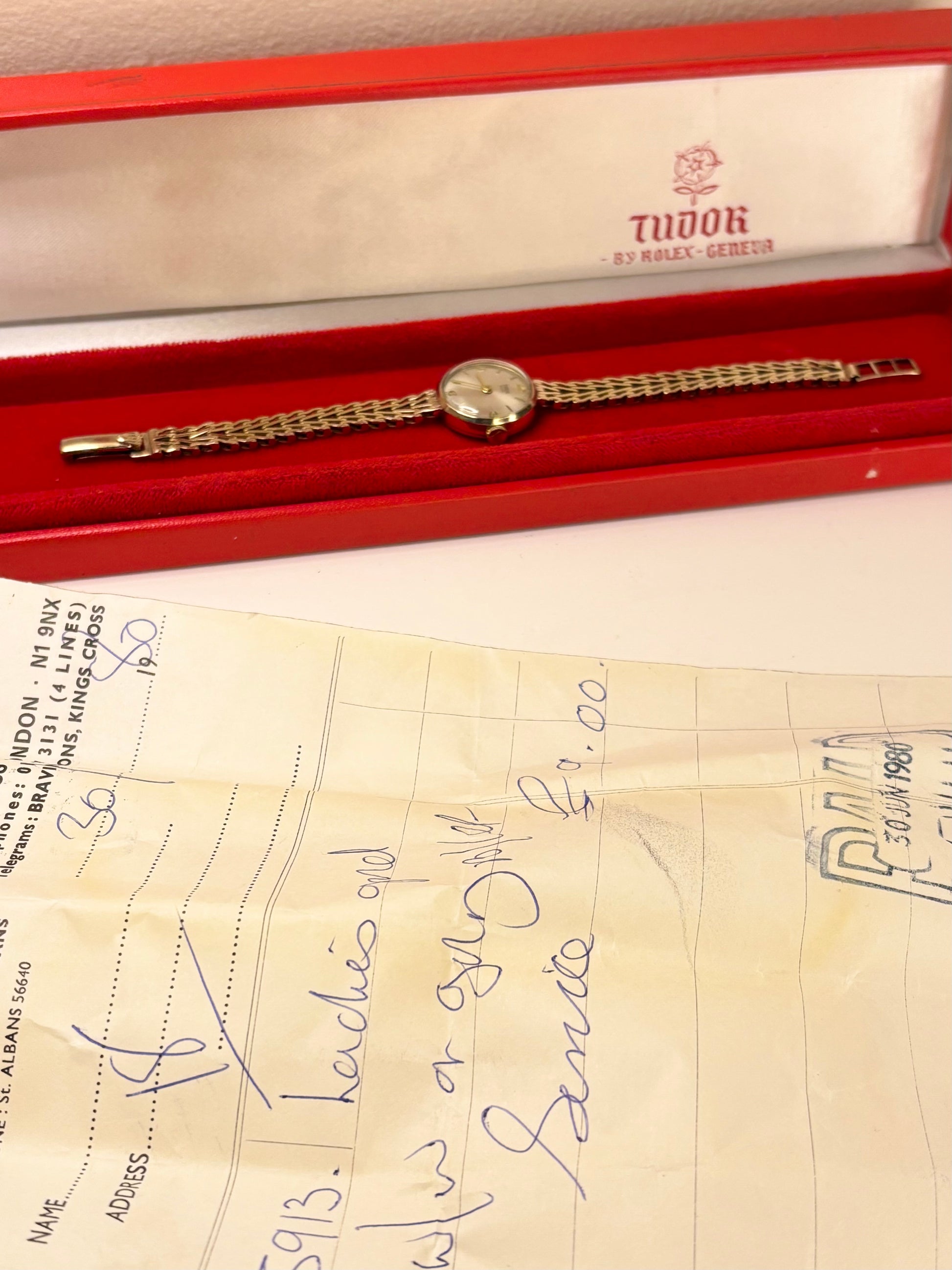box and papers image of the Tudor c.1964 ladies timepiece with polished 9ct gold case and sunburst dial, displayed as a charming vintage timekeeper.
