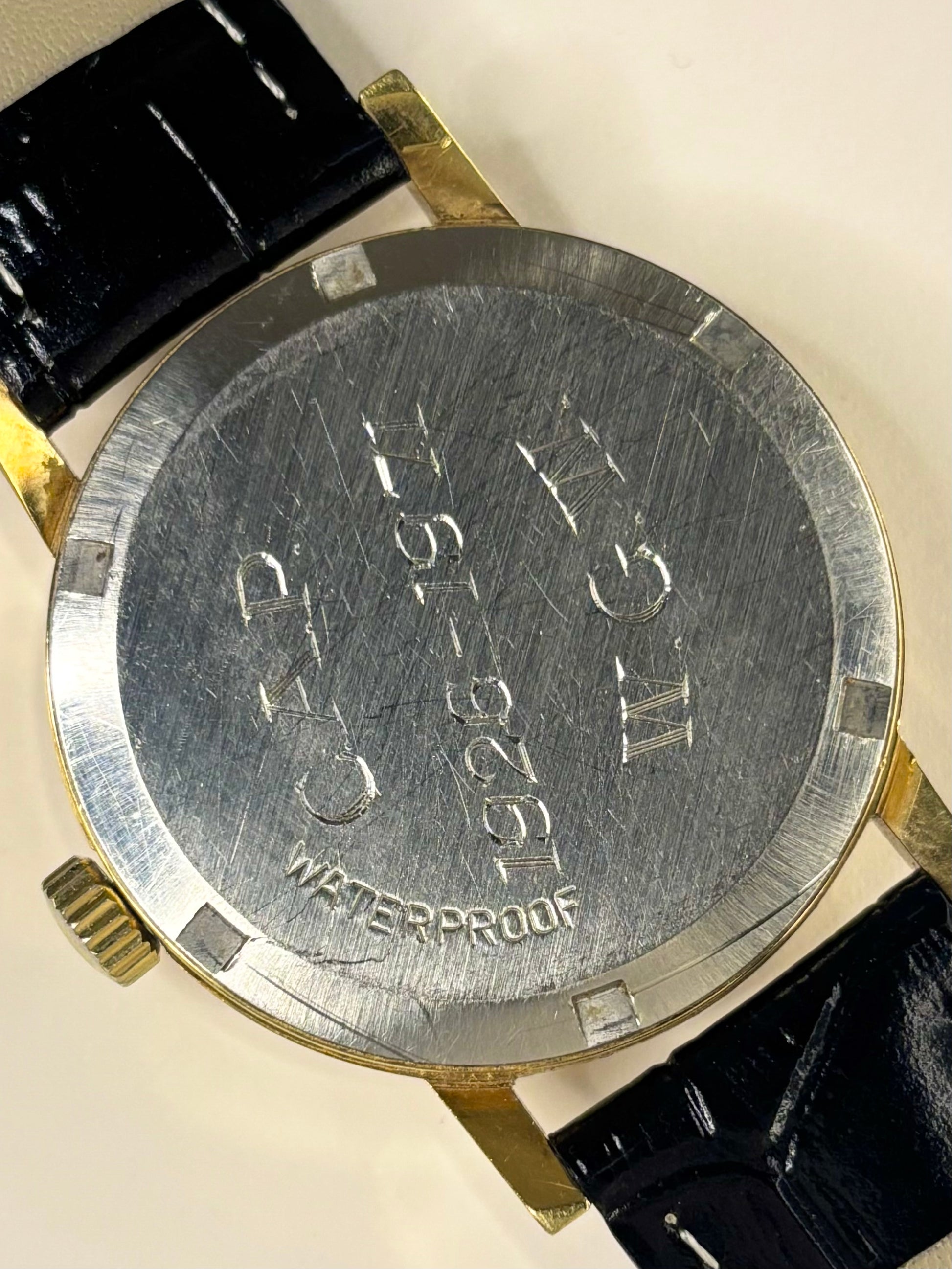 Vintage 1970 Omega Genève — 35mm gold-plated case, manual wind timepiece, signed caseback 